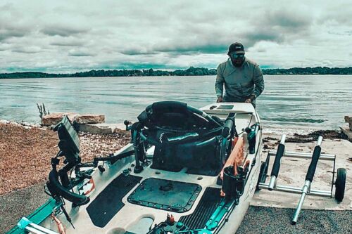 Rodney loading his Hobie PA 14 kayak onto the Ketch Kart for easy transport over rough terrain.