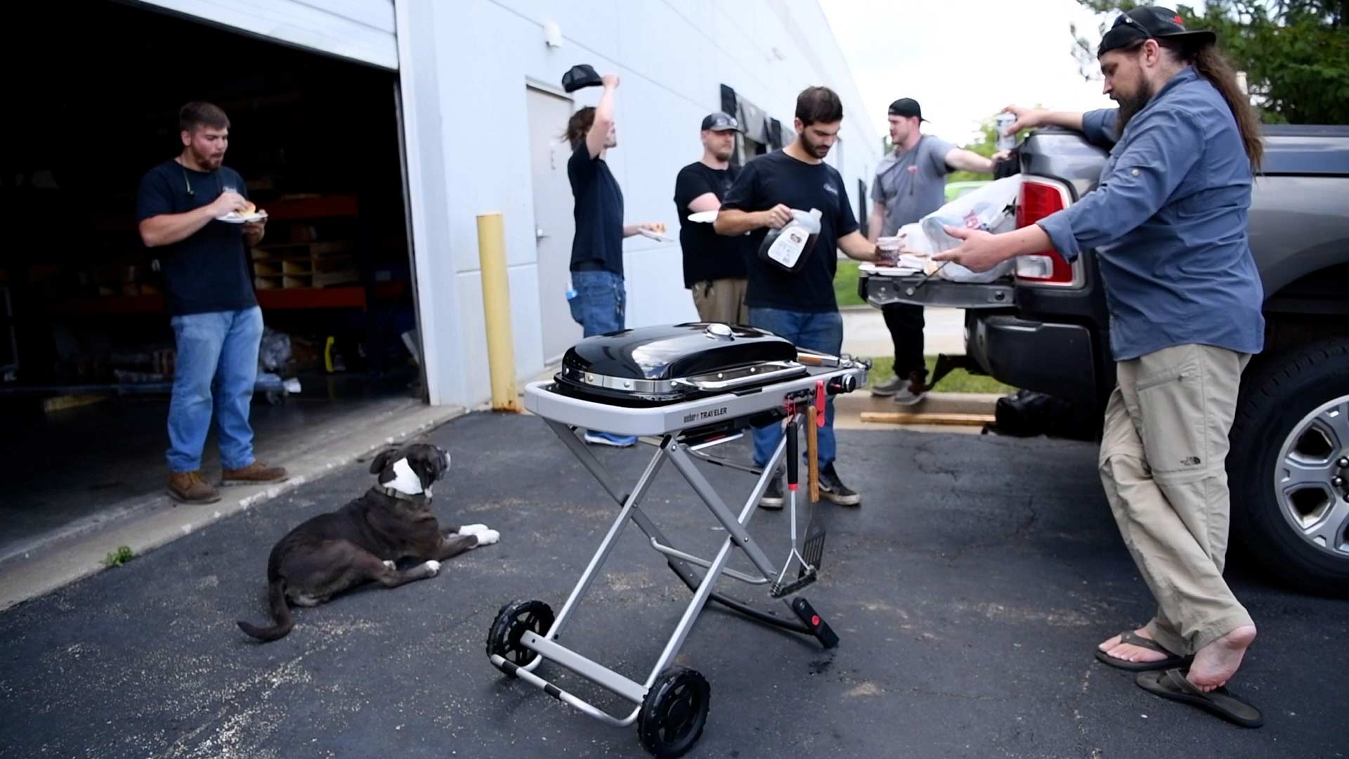 Ketch employees taking a break to cook out on the Weber Traveler grill.