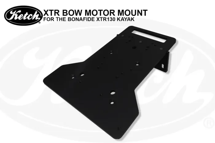 Close-up angled view of the Ketch XTR Bow Motor Mount for the Bonafide XTR130 kayak. The black anodized aluminum plate is shown with multiple pre-drilled mounting holes and a slotted cutout, highlighting its sturdy construction.