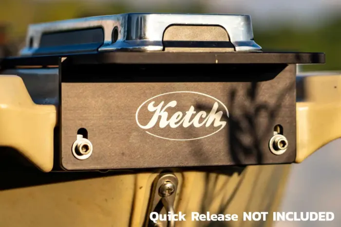 Close-up of the Ketch-branded kayak motor mount plate securely installed at the bow of a kayak, shown without the quick release bracket.