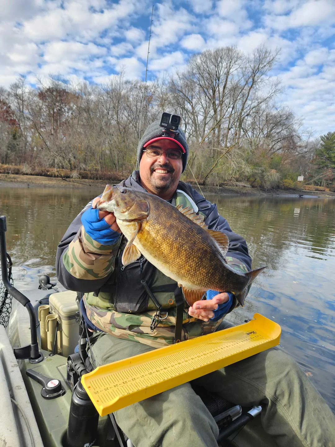 Paul from MN holds a nice bass up that he just measured on his Ketch Karbonate board.